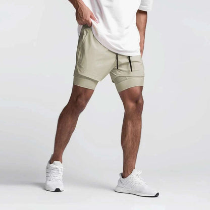 Men wearing beige 2 in 1 fitness gym shorts with towel loop and breathable mesh inner tights.