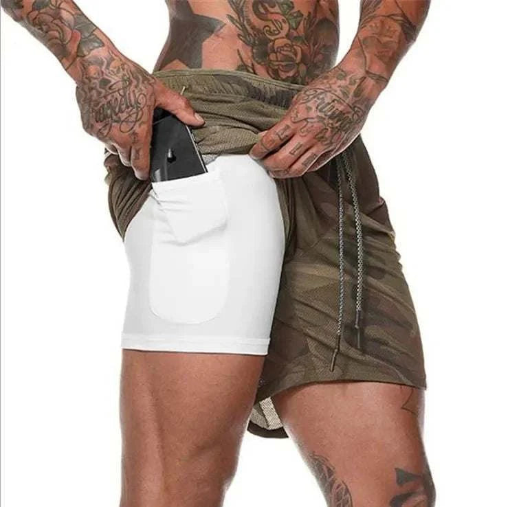 Men's breathable gym shorts with inner compression layer and side pocket for phone storage