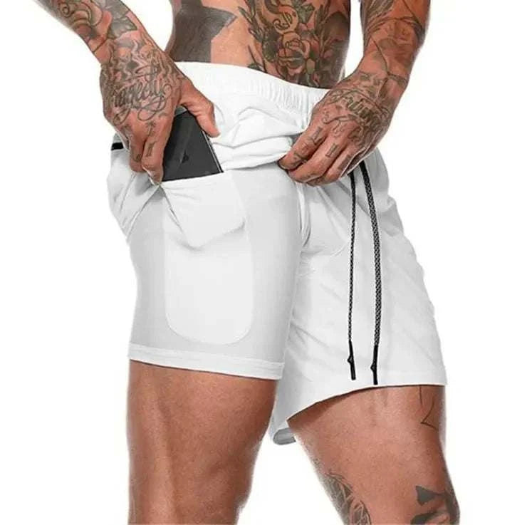 Men wearing white breathable gym shorts with inner compression layer and phone pocket